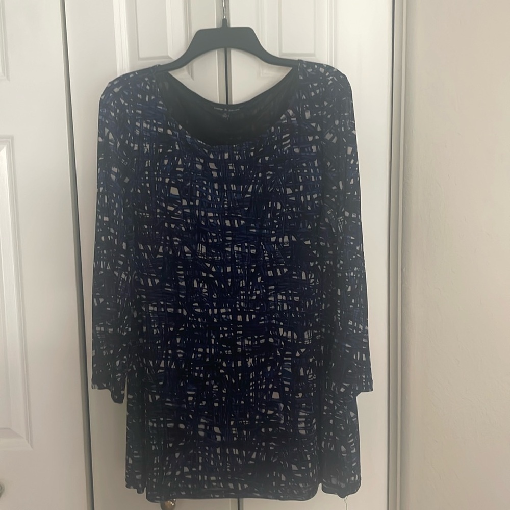 Long sleeve top. Sheer fabric, lined
